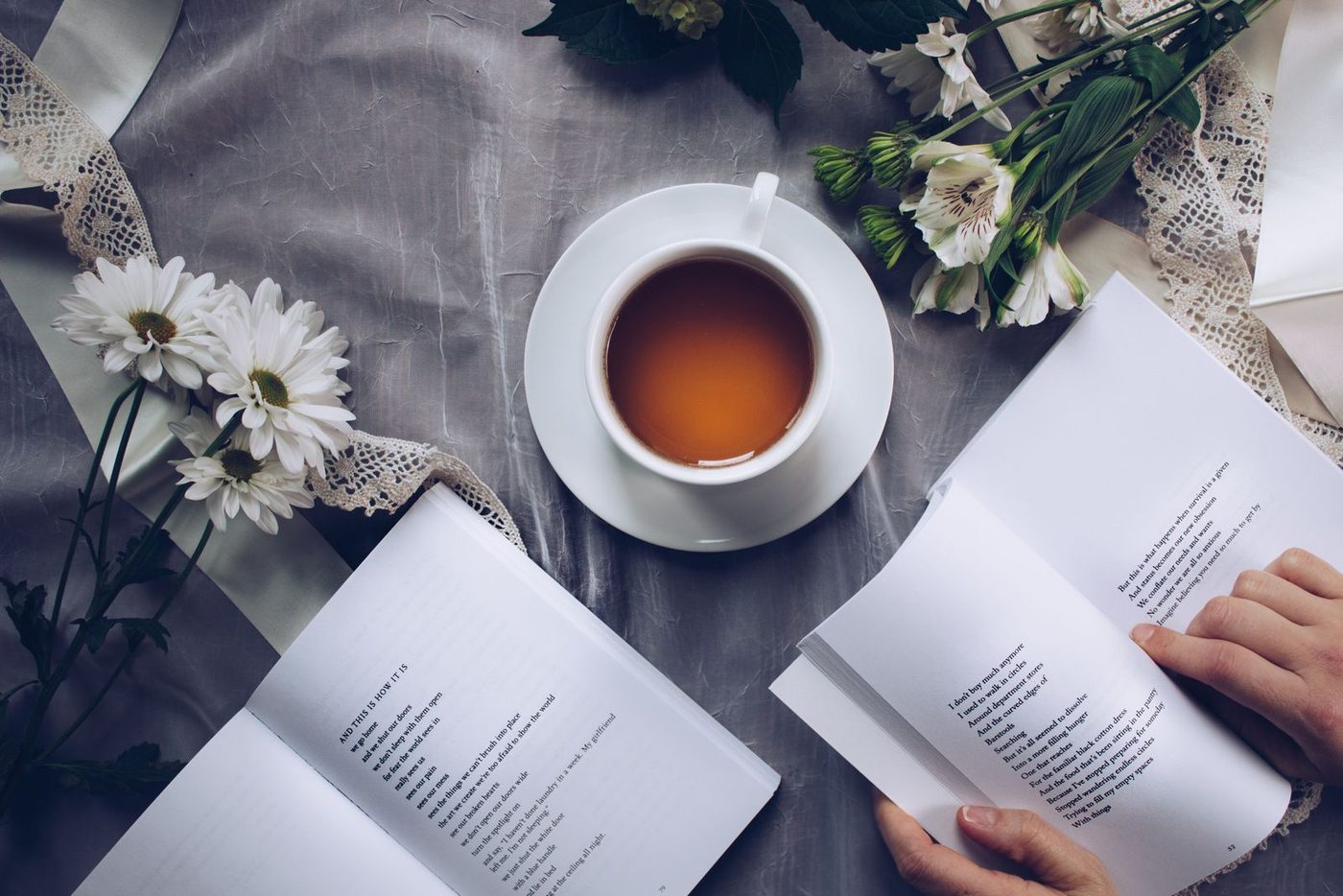 A person reading an open book